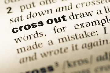 Obraz premium Close up of old English dictionary page with word cross out