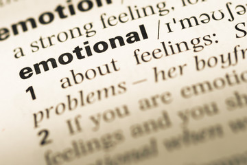 Fototapeta premium Close up of old English dictionary page with word emotional