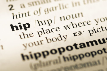 Close up of old English dictionary page with word hip