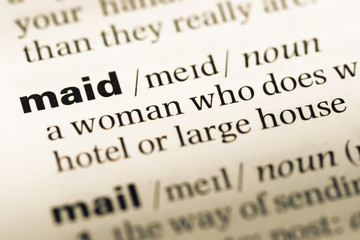 Close up of old English dictionary page with word maid