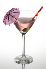 martini drink with stick on white background