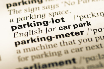Fototapeta premium Close up of old English dictionary page with word parking lot