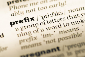 Close up of old English dictionary page with word prefix