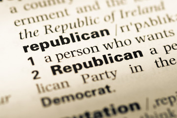 Obraz premium Close up of old English dictionary page with word republican