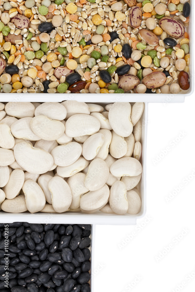 Poster cropped image of assorted beans on a container