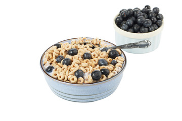 breakfast bowl with bowl of grapes in background.