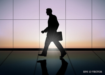businessman is walking in the building