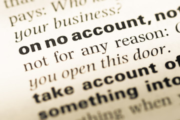 Obraz premium Close up of old English dictionary page with word on no account