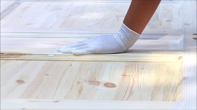 painting wooden surface with white color
