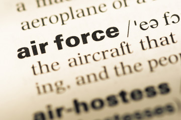 Obraz premium Close up of old English dictionary page with word air force