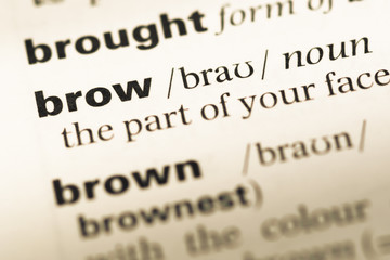 Close up of old English dictionary page with word brow