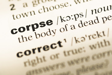 Fototapeta premium Close up of old English dictionary page with word corpse