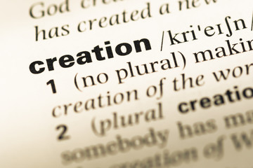 Obraz premium Close up of old English dictionary page with word creation