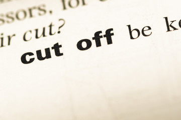 Close up of old English dictionary page with word cut off