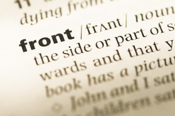 Fototapeta premium Close up of old English dictionary page with word front