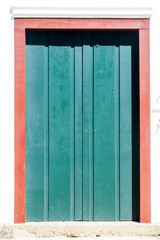 Typical historical colourful wood doors in the colonial downtown of Paraty, Rio de Janeiro, Brazil.