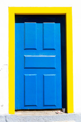 Typical historical colourful wood doors in the colonial downtown of Paraty, Rio de Janeiro, Brazil.