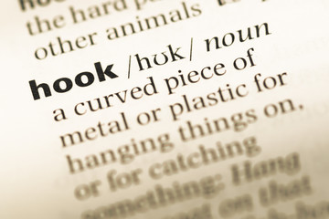 Fototapeta premium Close up of old English dictionary page with word hook