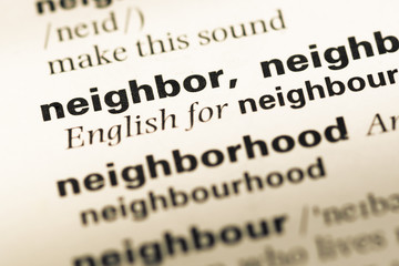 Obraz premium Close up of old English dictionary page with word neighbor