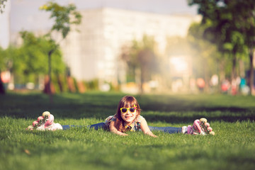 girl on grass in the park.