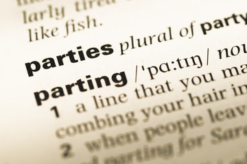 Close up of old English dictionary page with word parties