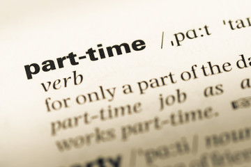 Close up of old English dictionary page with word part time