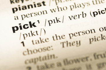 Fototapeta premium Close up of old English dictionary page with word pick