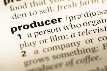 Fototapeta premium Close up of old English dictionary page with word producer