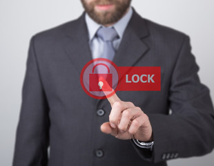 technology, internet and networking concept. man in a black business shirt. woman presses lock...