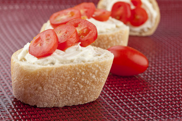 slices of bread with cherry tomatoes