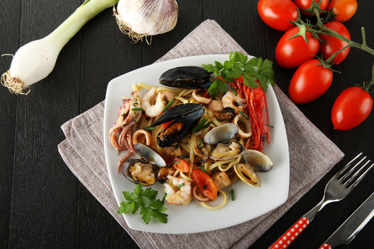 Italian pasta with seafood, mussels, clams, shrimp and squid