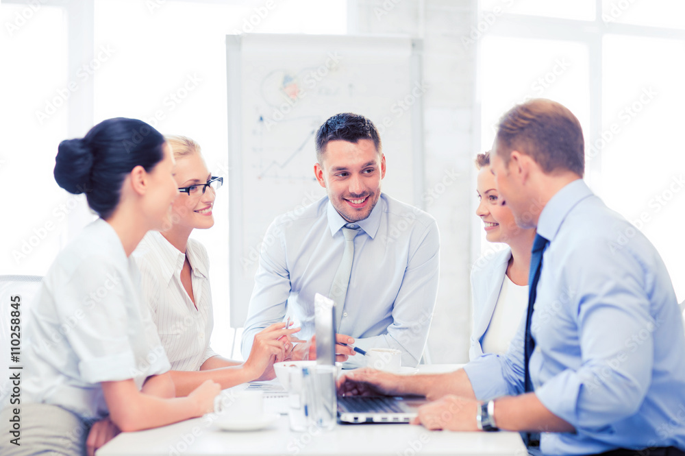 Wall mural business team having meeting in office