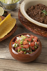 salsa, taco shells and ground beef