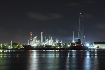 Beautiful light of oil refinery factory in night time.