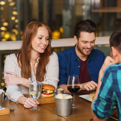 friends at restaurant having dinner