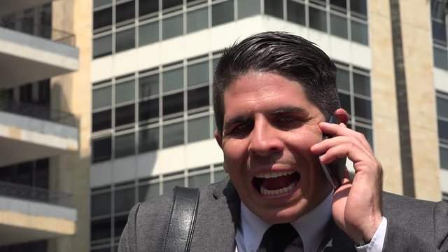 Angry Business Man Using Cell Phone