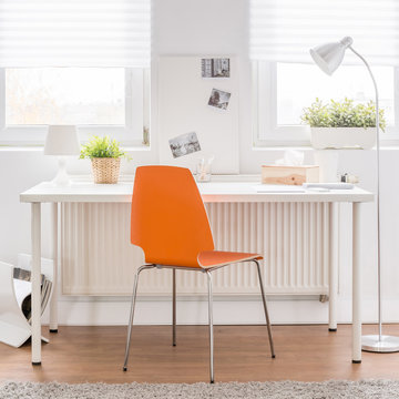 Desk with orange chair