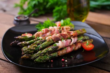  Grilled violet asparagus wrapped with bacon © timolina