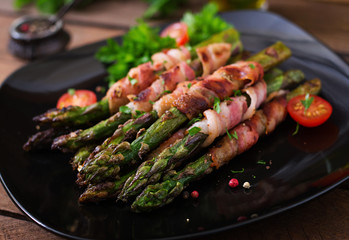 Grilled violet asparagus wrapped with bacon