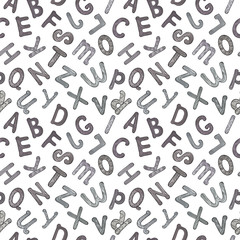 seamless pattern of letters of the alphabet in the patterns on a white background