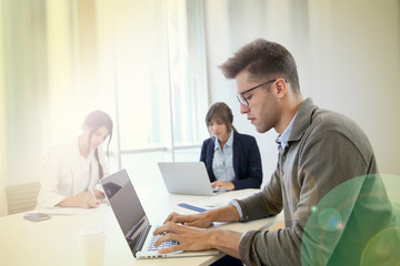 Start-up businesspeople sharing working space