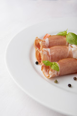 Black forest ham on white plate