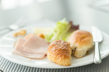 American breakfast on white plate.