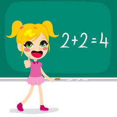 Cute little blonde school girl making thumbs up hand sign celebrating solving mathematics sum calculation
