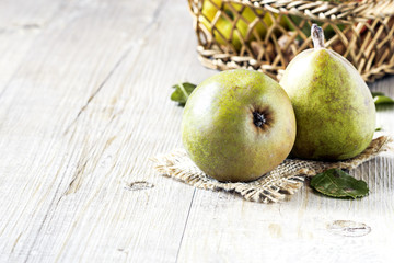 Pears on a rustic wooden kitchen table