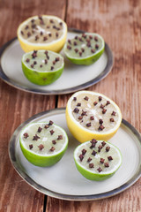 Lemon and limes with cloves, natural insect repellent