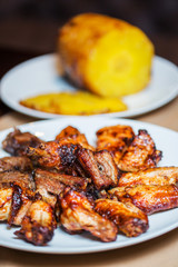 Grilled meats, hot pieces on a dish