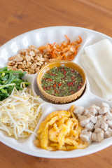 Fresh vegetables, beans, flour, complementing the food plate Tha