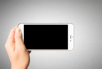 Touch screen smartphone in hand..