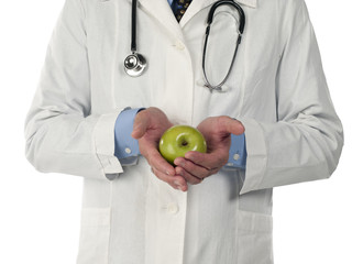 mid section of a doctor with apple.